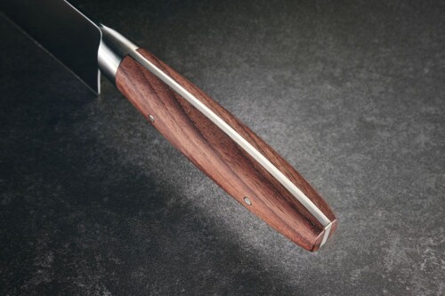 <p><strong>GEFU Нож на майстора с дървена дръжка “ENNO“ </strong><br /><strong>• 100% произведено в Солинген (Германия)<br />• Отлични режещи свойства<br />• Дълготрайна острота<br />• Перфектен баланс<br />• Висока ефективност при рязане<br />• Първокласно качество на острието SOLINGEN:<br /> - висококачествена немска стомана за ножове тип 1.4116<br /> - със студено закаляване<br /> - ръчно заточване<br /> - с твърдост (по Рокуел)- HRC 57<br />• Ергономична дръжка от естествено орехово дърво<br />• Благодарение на извитата форма на острието, той е идеален за рязане на голямо разнообразие от храни<br /></strong><strong>• Материал:</strong> острие от немска стомана / дърво орех<br /><strong>• Дължина на острието: </strong>15 см<br /> <strong>• Размери: </strong>28,3 х 2,3 х 4,7 см ( ДхШхВ)<br /><strong>• Тегло:</strong> 0,165 кг<br /><strong>• НЕ Е ПОДХОДЯЩ  за съдомиялна машина<br /></strong><strong>Производител: GEFU / Германия<br /><br /><br /></strong></p><br />Марка: GEFU - GERMANY <br />Модел: GEFU 14003<br />Доставка: 2-4 работни дни<br />Гаранция: 2 години