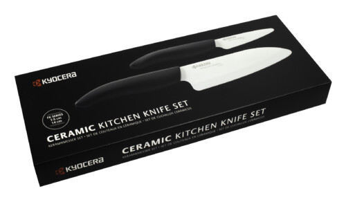 <p><strong>KYOCERA Комплект ножове 2 бр. - FK-075WH-BK / FK-140WH-BK</strong><br /><span>  – Керамичен нож Kyocera FK-140 WH-BK (острие 14 см) - 1 бр. </span><br /><span>  – Керамичен нож Kyocera FK-075 WH-BK (острие 12,5 см) - 1 бр. </span><br /><span><strong>• Бяло острие, черна дръжка</strong></span><br /><span><strong>• Материал острие: </strong>циркониева керамика<strong><br />• Материал дръжка: </strong>пластмаса<strong><br />• Изключително остри</strong></span><br /><span><strong>• С ергономични дръжки </strong></span><br /><span><strong>• Не използвайте за рязане на твърди или замразени храни</strong></span><br /><span><strong>• Подходящи за съдомиялна машина.<br /></strong><strong>Производител: KYOCERA / Япония</strong></span></p><br />Марка: KYOCERA <br />Модел: Kyocera FK-2PC-WH-BK<br />Доставка: 2-4 работни дни<br />Гаранция: 2 години