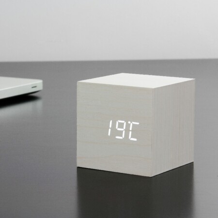 <p><strong>GINGKO Часовник/термометър “CUBE“ - бяло дърво с бели цифри</strong><br /><strong>• Показва последователно час, дата и температура</strong><br /><strong>• Настройка за активиране чрез звук или постоянно включен дисплей<br /></strong><strong>• Настройка на алармата с интелигентна функция за дрямка<br /></strong><strong>• Възможност за настройка на алармата за 5 или 7 дни<br /></strong><strong>• Автоматична димер функция:</strong><span> дисплеят ще се затъмни автоматично на 2/3 между 21,00 - 7,00 часа</span><br /><strong>• Избор на формат на часа:</strong><span> 12/24 часа</span><br /><strong>• Избор на формат на температурата:</strong><span> Целзий/Фаренхай<br /><strong>• Захранване:</strong> 5V - 500 mA (включен захранващ кабел)</span><br /><strong>• Захранване:</strong><span> 3хААА (не са включени в комплекта)<br /></span><strong>• Материал:</strong><span> дърво</span><br /><strong>• Цвят на часовника:</strong><span> бял<br /><strong>• Цвят на цифрите:</strong> бял</span><br /><strong>• Размери:</strong><span> 6,8 х 6,8 х 6,8 см. </span><br /><strong>• Тегло на продукта:</strong><span> 0,120 кг</span><br /><strong>• Тегло с опаковката:</strong><span> 0,150 кг. </span><br /><strong>Производител: GINGKO DESIGN/ Англия</strong></p><br />Марка: Gingko Design <br />Модел: Gingko GK08W13<br />Доставка: 2-4 работни дни<br />Гаранция: 2 години