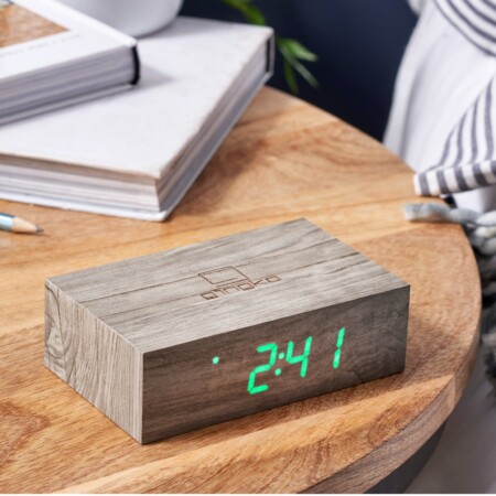 <p><strong>GINGKO Часовник/будилник “Flip Cilck Clock“ - ясен</strong><br /><strong>• Настройка за активиране чрез звук или постоянно включен дисплей<br /></strong><strong><strong>• <strong>Възможност </strong>да отложите или изключите алармата, като докоснете произволен бутон или обърнете часовника</strong><br /></strong><strong>• Автоматично обръщане на числата, когато се обърне часовника</strong><br /><strong>• Избор на формат на часа:</strong><span> 12/24 часа</span><br /><span><strong>• Захранване:</strong><span> акумулаторна батерия: 2000 mAh (включен кабел за зареждане)</span><br /><strong>• Вход за зареждане:</strong><span> DC 5V (не е включен адаптор)</span><br /><strong>• Време за зареждане:</strong><span> 3-4 часа</span><br /><strong>• Живот на батерията с едно зареждане:</strong><br /><span> - при настройка на активиране със звук - около 5-6 мес.</span><br /><span> - при постоянно включен дисплей - 2-3 седмици<br /><strong>• Лазерно гравирани тъч бутони</strong></span></span><span><br /></span><strong>• Цвят на часовника:</strong><span> ясен<br /><strong>• Цвят на цифрите:</strong> зелен</span><br /><strong>• Размери:</strong><span> 11,5 х 7 х 3,6 см. </span><br /><strong>• Тегло на продукта:</strong><span> 0,150 кг</span><br /><strong>• Тегло с опаковката:</strong><span> 0,200 кг. </span><br /><strong>Производител: GINGKO DESIGN/ Англия</strong></p><br />Марка: Gingko Design <br />Модел: Gingko G003A12<br />Доставка: 2-4 работни дни<br />Гаранция: 2 години
