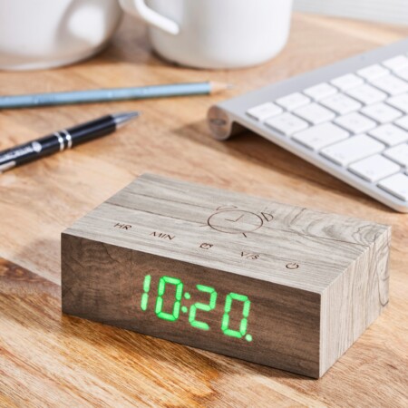 <p><strong>GINGKO Часовник/будилник “Flip Cilck Clock“ - ясен</strong><br /><strong>• Настройка за активиране чрез звук или постоянно включен дисплей<br /></strong><strong><strong>• <strong>Възможност </strong>да отложите или изключите алармата, като докоснете произволен бутон или обърнете часовника</strong><br /></strong><strong>• Автоматично обръщане на числата, когато се обърне часовника</strong><br /><strong>• Избор на формат на часа:</strong><span> 12/24 часа</span><br /><span><strong>• Захранване:</strong><span> акумулаторна батерия: 2000 mAh (включен кабел за зареждане)</span><br /><strong>• Вход за зареждане:</strong><span> DC 5V (не е включен адаптор)</span><br /><strong>• Време за зареждане:</strong><span> 3-4 часа</span><br /><strong>• Живот на батерията с едно зареждане:</strong><br /><span> - при настройка на активиране със звук - около 5-6 мес.</span><br /><span> - при постоянно включен дисплей - 2-3 седмици<br /><strong>• Лазерно гравирани тъч бутони</strong></span></span><span><br /></span><strong>• Цвят на часовника:</strong><span> ясен<br /><strong>• Цвят на цифрите:</strong> зелен</span><br /><strong>• Размери:</strong><span> 11,5 х 7 х 3,6 см. </span><br /><strong>• Тегло на продукта:</strong><span> 0,150 кг</span><br /><strong>• Тегло с опаковката:</strong><span> 0,200 кг. </span><br /><strong>Производител: GINGKO DESIGN/ Англия</strong></p><br />Марка: Gingko Design <br />Модел: Gingko G003A12<br />Доставка: 2-4 работни дни<br />Гаранция: 2 години